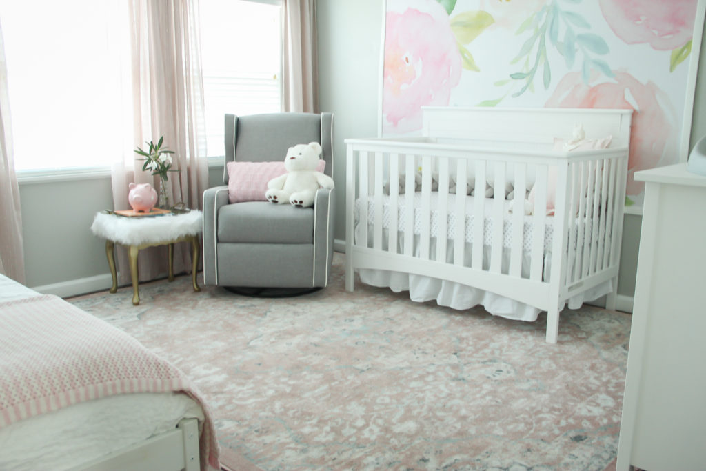 blush nursery, nursery ideas, dana moris, wayfair rug, blush rug, tapestry, floral wall, white crib, target bedding, girl nursery ideas, interior design